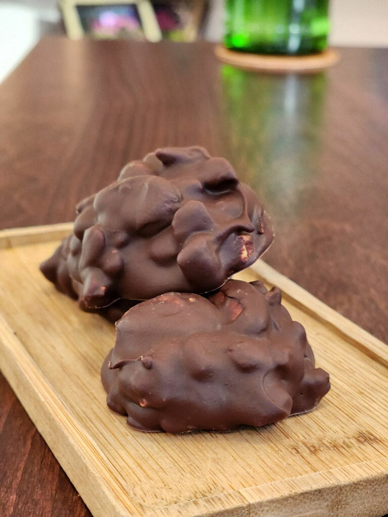 Simple, crunchy cluster packed with cashews, pecans and whole raw cacao beans from Ecuador with Ecuador and Belize Cacao, local honey and Himalayan salt.