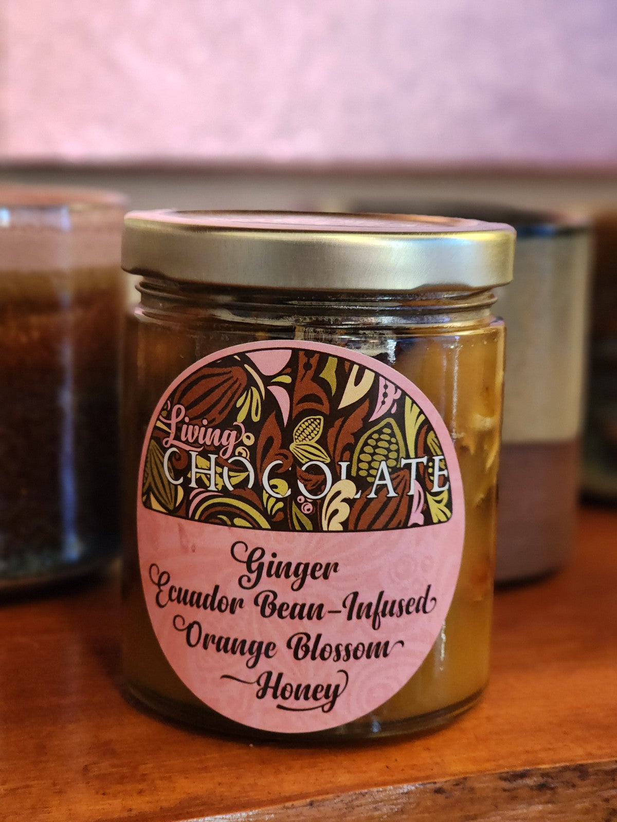 Closed jar of Ginger Ecuador Bean Infused Orange Blossom Honey