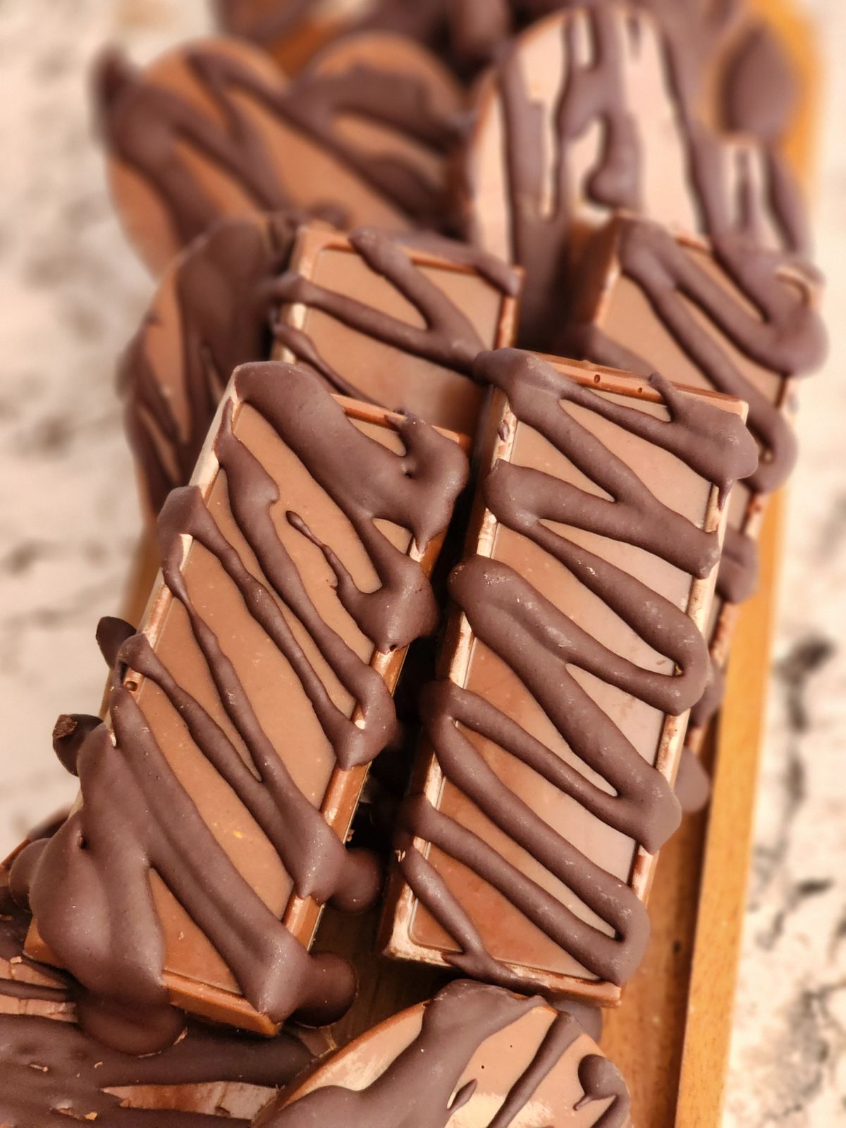 Peanut butter bars include a layer of Ecuador cacao, Belize cacao, and local honey topped with carob (carob, eco-friendly palm oil, inulin) and Valencia Peanut Butter for a creamy peanut- butter-cup reminiscent treat.